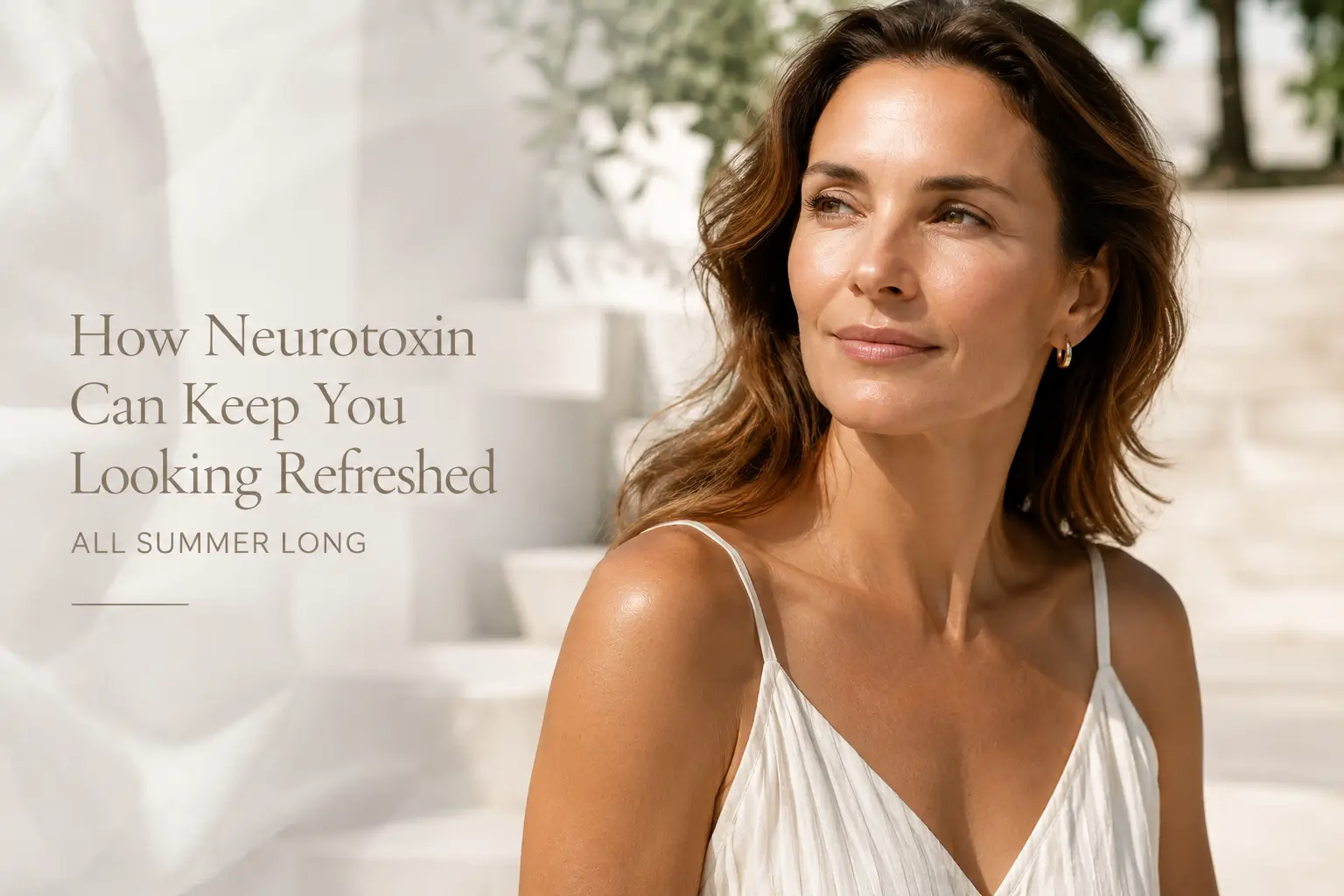 Woman with smooth, refreshed skin enjoying a summer day outdoors after neurotoxin treatment
